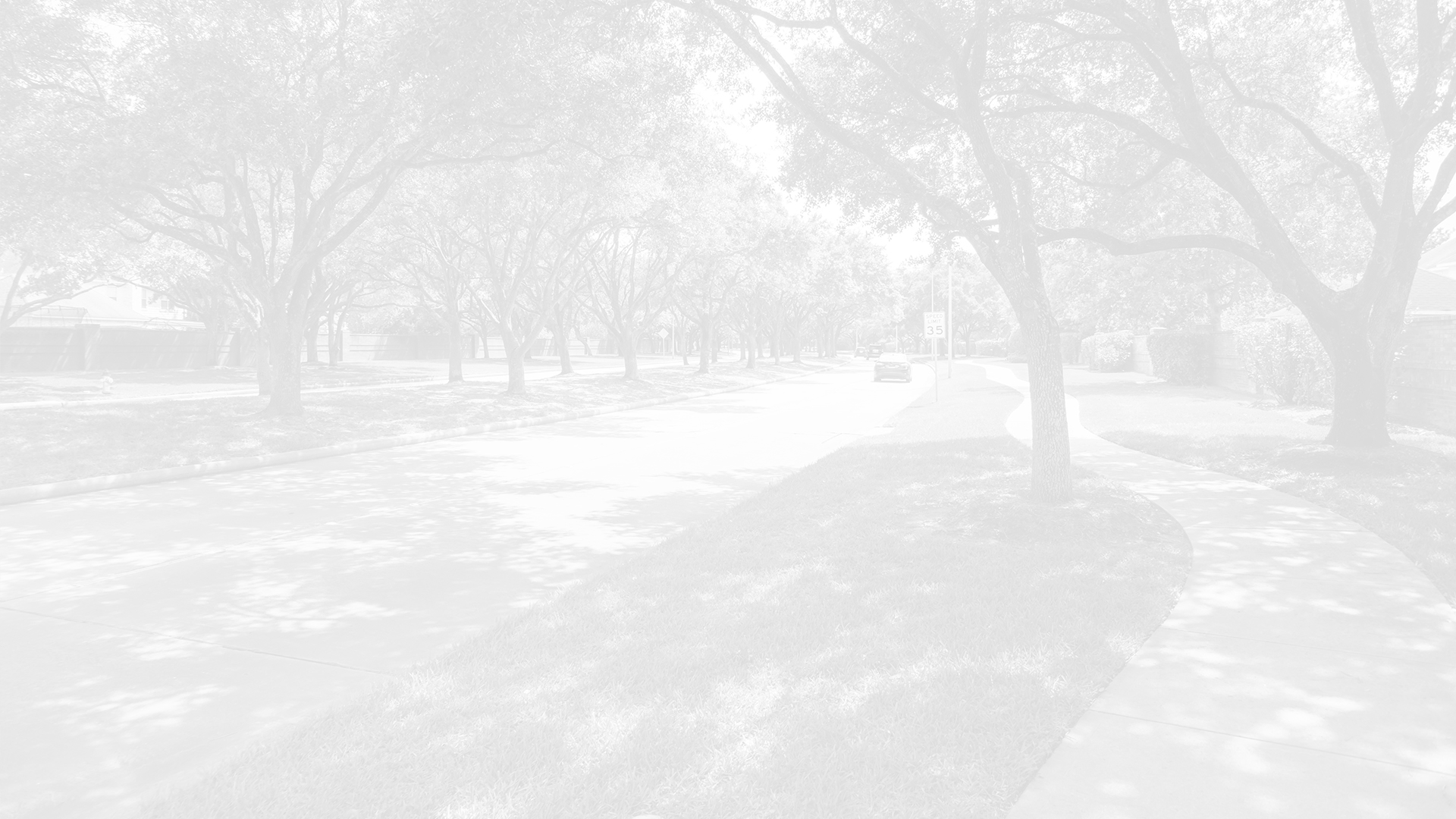 Tree-lined Twin Chimneys boulevard